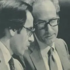 Miguel Boyer y Salvador looking at documents.