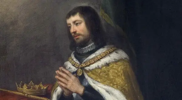 Retrato de Fernando el Santo, con las manos juntas en oración, corona y cetro a su lado.