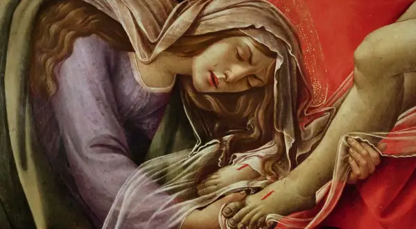 Detalle de una pintura: María Magdalena, con el rostro sereno, sostiene el pie de Cristo.