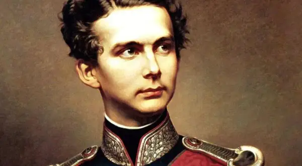 Retrato de Fernando de Baviera, joven noble con uniforme militar, mirada serena y cabello oscuro peinado.