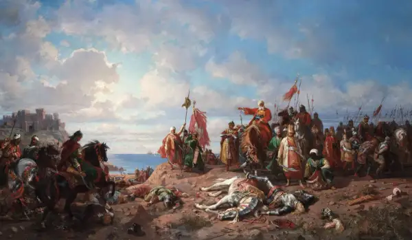 Soldados a caballo y a pie, con armaduras y estandartes, celebran una victoria en la costa. Un castillo se alza al fondo. Escena de la expansión del imperio otomano.
