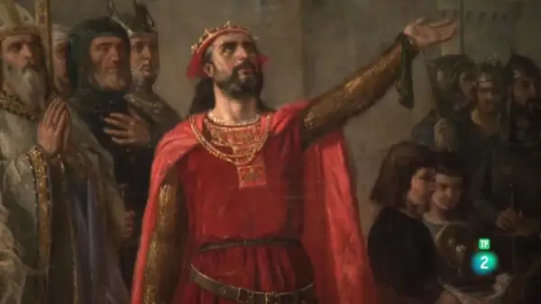 Alfonso V de Portugal, coronado y con capa roja, levanta su mano ante una corte.