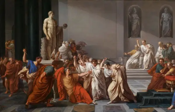 El asesinato de Julio César: hombres con togas atacan a César con dagas en un salón con estatuas.