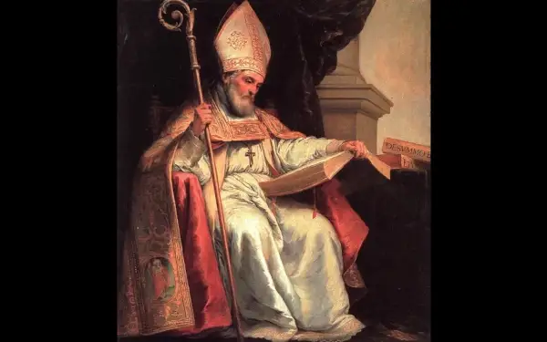 Isidoro de Sevilla, obispo con mitra y báculo, lee un libro.